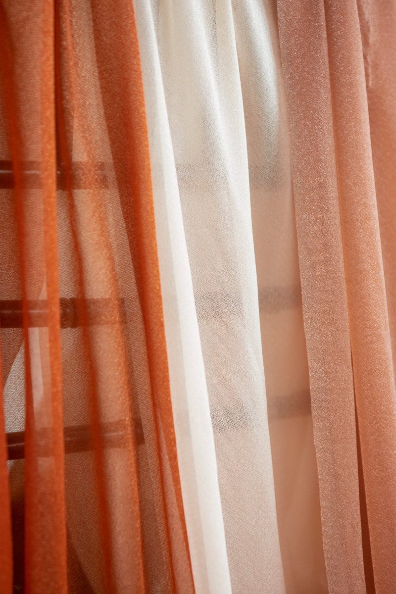 Wedding Arch Drapes in Burnt Orange & Scarlet - Image 3